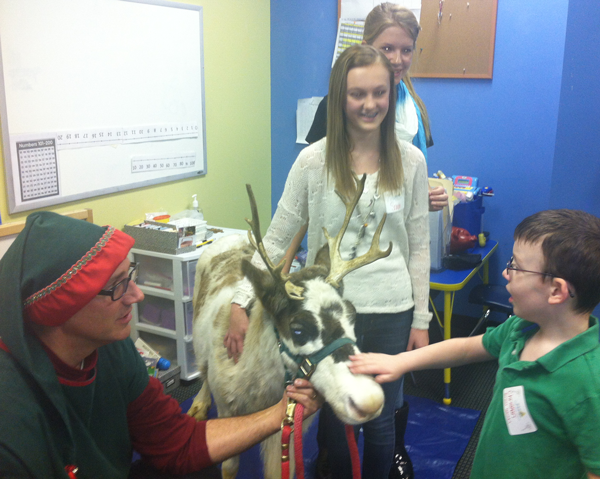 Jingle John and Misfit, the reindeer, visit with party guests in Carmel. Jingle John and Misfit, the reindeer, visit with party guests in Carmel.